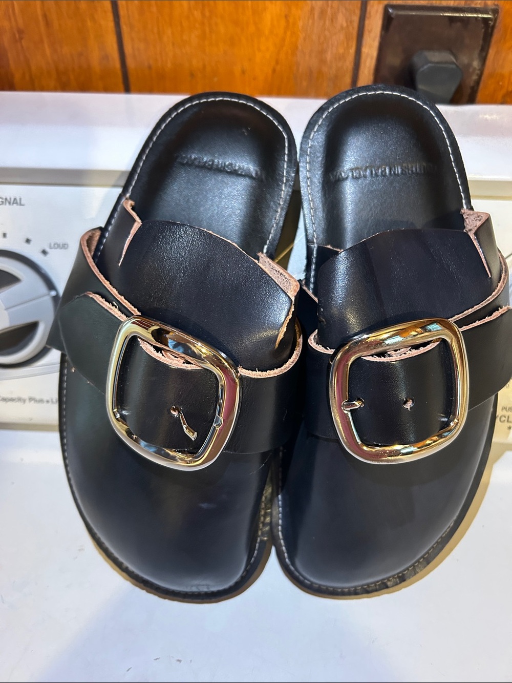 Stussy Black Leather Slide Mules with Gold Buckles and Tan Trim